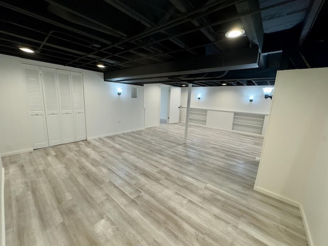 2122 Mandel Ave, Westchester, IL 60154 - finished below grade area with wood finished floors and baseboards