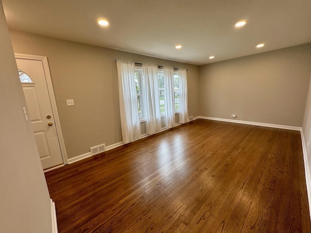 2122 Mandel Ave, Westchester, IL 60154 - empty room featuring dark wood-style flooring, recessed lighting, and baseboards