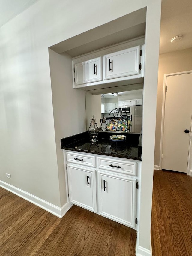 2122 Mandel Ave, Westchester, IL 60154 - bar area featuring dark wood-style floors and baseboards