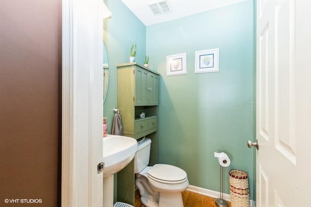 9675 Newton Rd, Huntley, IL 60142 - half bath with toilet and wood finished floors