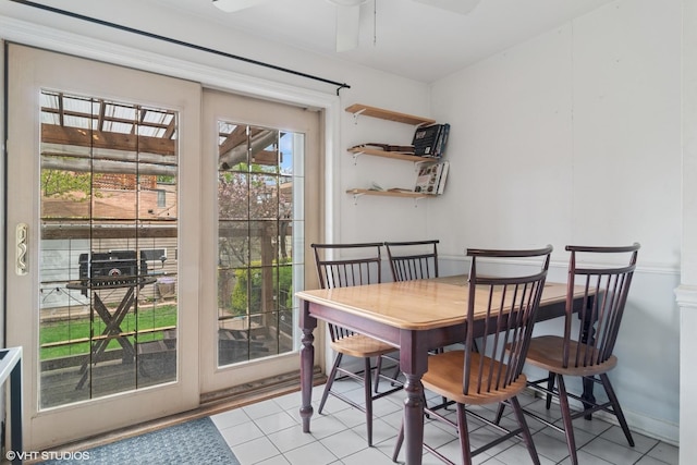 3624 N Leavitt St, Chicago, IL 60618 - dining room with light tile patterned floors and a ceiling fan