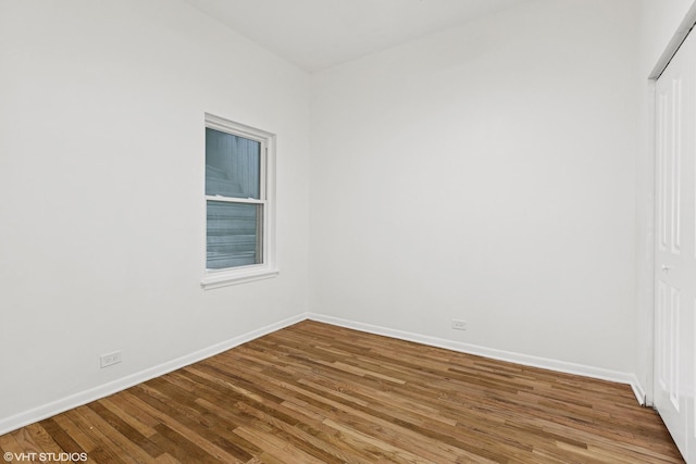 2424 N Seminary Ave, Chicago, IL 60614 - unfurnished room featuring wood finished floors and baseboards