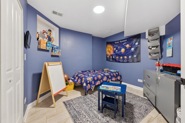 bedroom featuring baseboards