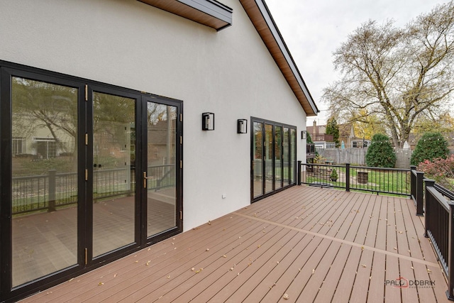 wooden deck featuring fence