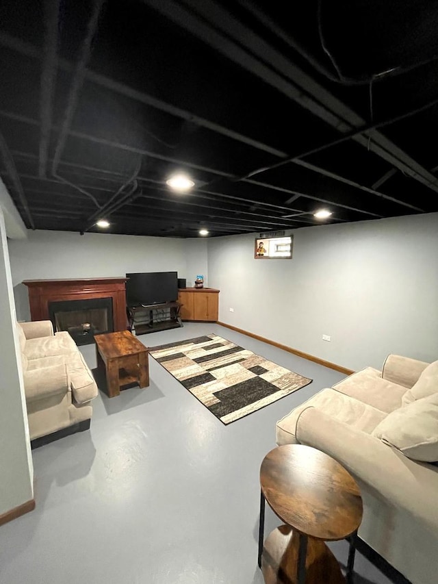 5941 W 99th St, Oak Lawn, IL 60453 - finished below grade area with a fireplace and baseboards