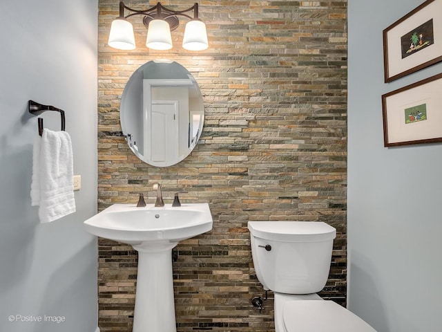 bathroom featuring toilet