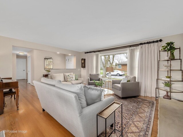 living area featuring light wood-style flooring