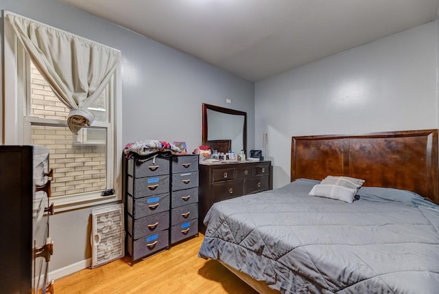 1230 S 57th Ct, Cicero, IL 60804 - bedroom with light wood-style flooring and baseboards