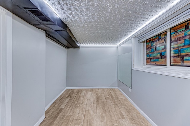 1230 S 57th Ct, Cicero, IL 60804 - finished basement with an ornate ceiling, wood finished floors, and baseboards