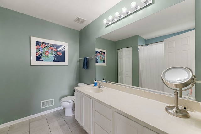 16030 Tahoe Ln, Crest Hill, IL 60403 - bathroom with toilet, baseboards, tile patterned flooring, and vanity