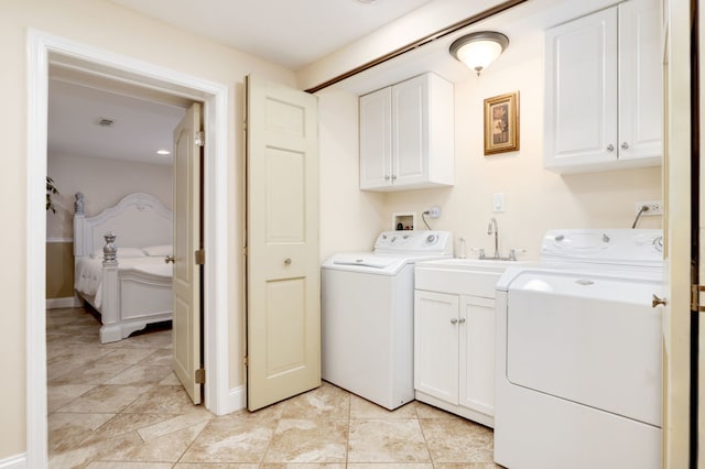 2936 Warbler Pl, Highland Park, IL 60035 - laundry area featuring cabinet space and independent washer and dryer