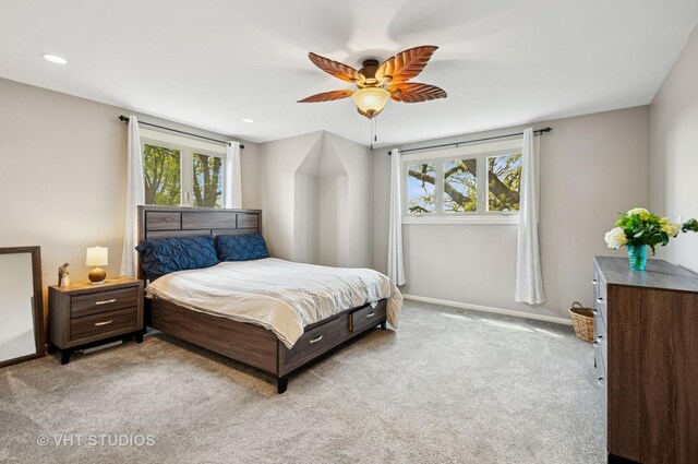 670 Ballantrae Dr Unit 900C, Northbrook, IL 60062 - bedroom featuring light carpet, multiple windows, baseboards, a ceiling fan, and recessed lighting