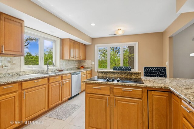 670 Ballantrae Dr Unit 900C, Northbrook, IL 60062 - kitchen featuring dishwasher, black electric cooktop, backsplash, and plenty of natural light