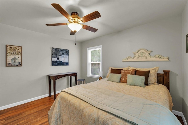 505 S Maple St, Urbana, IL 61801 - bedroom featuring baseboards, wood finished floors, and ceiling fan