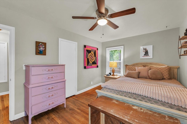 505 S Maple St, Urbana, IL 61801 - bedroom featuring wood finished floors, baseboards, and ceiling fan