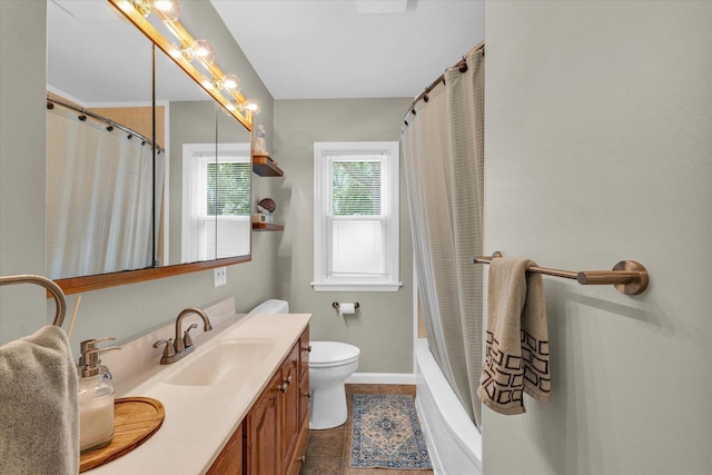 505 S Maple St, Urbana, IL 61801 - bathroom with vanity, toilet, baseboards, tile patterned flooring, and shower / bath combo