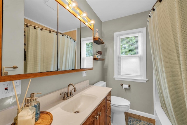 505 S Maple St, Urbana, IL 61801 - bathroom featuring toilet, vanity, baseboards, shower / tub combo with curtain, and tile patterned flooring