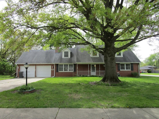 cape cod-style house with brick siding, covered porch, a front lawn, and an attached garage