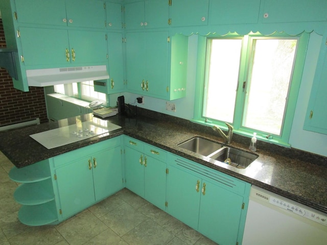 kitchen featuring white appliances, under cabinet range hood, a sink, open shelves, and plenty of natural light