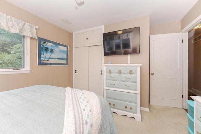 504 Delmar Ln, Bloomington, IL 61701 - bedroom with light carpet and a closet