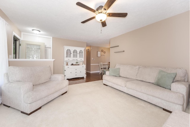 504 Delmar Ln, Bloomington, IL 61701 - living area featuring ceiling fan and wood finished floors
