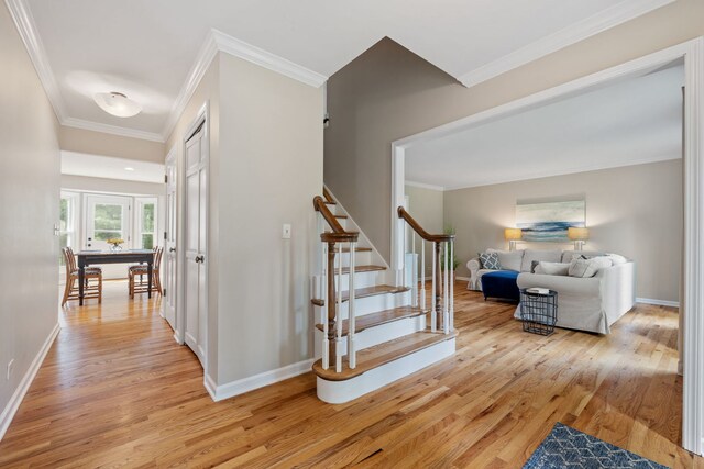 424 Dilorenzo Dr, Naperville, IL 60565 - stairway with wood finished floors, crown molding, and baseboards