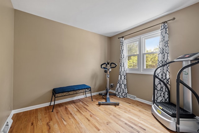 424 Dilorenzo Dr, Naperville, IL 60565 - workout room with wood finished floors and baseboards