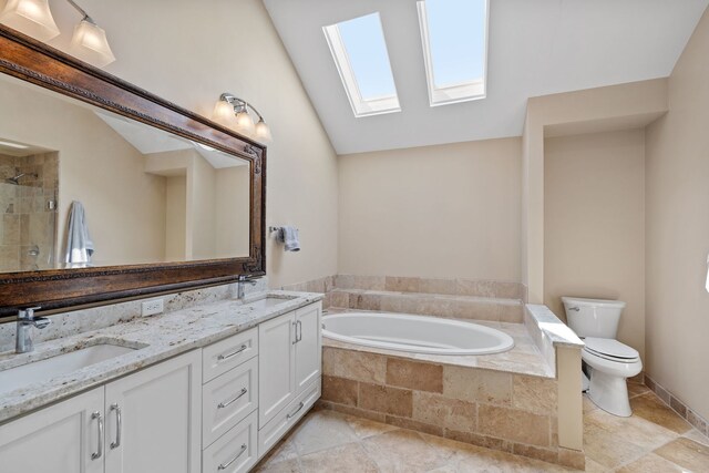 424 Dilorenzo Dr, Naperville, IL 60565 - bathroom featuring a skylight, toilet, vaulted ceiling, a bath, and double vanity