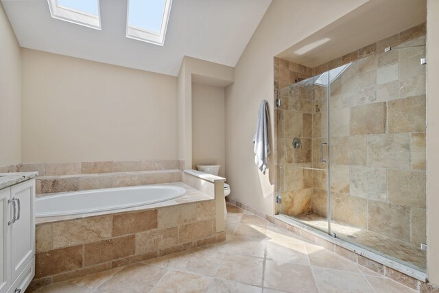 424 Dilorenzo Dr, Naperville, IL 60565 - bathroom featuring toilet, stone tile floors, a shower stall, lofted ceiling, and a garden tub