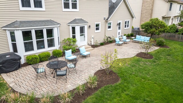 424 Dilorenzo Dr, Naperville, IL 60565 - back of property featuring an outdoor living space, a patio, and roof with shingles