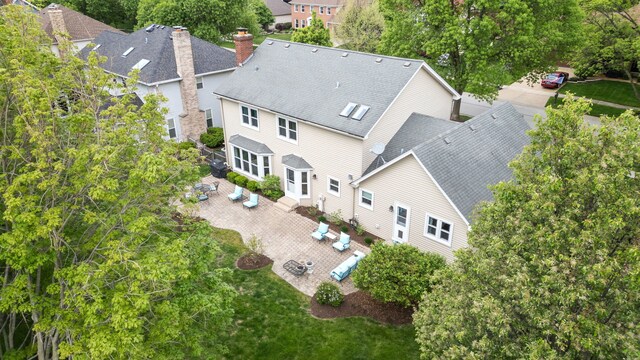 424 Dilorenzo Dr, Naperville, IL 60565 - aerial view of property and surrounding area featuring a tree filled landscape