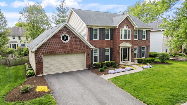 424 Dilorenzo Dr, Naperville, IL 60565 - colonial inspired home featuring driveway, brick siding, an attached garage, and a shingled roof