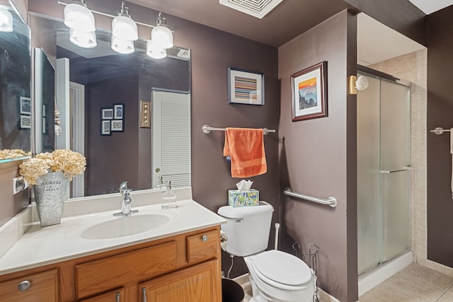 5155 Madison St Unit 204, Skokie, IL 60077 - bathroom with tile patterned floors, a stall shower, toilet, and vanity