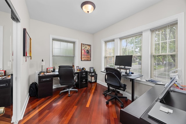 3848 N Lamon Ave Unit 1, Chicago, IL 60641 - home office with dark wood-style flooring and baseboards