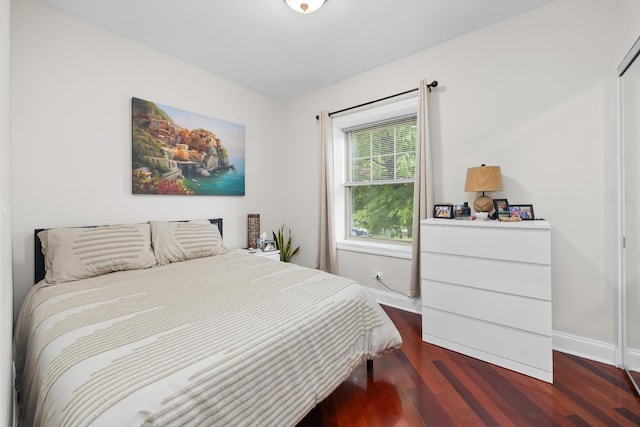 3848 N Lamon Ave Unit 1, Chicago, IL 60641 - bedroom featuring baseboards and wood finished floors