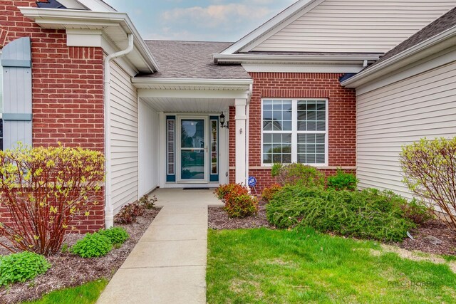 3629 Canton Cir, Mundelein, IL 60060 - property entrance with brick siding and a shingled roof