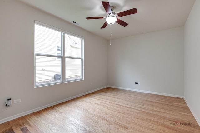 3629 Canton Cir, Mundelein, IL 60060 - unfurnished room with ceiling fan, light wood-style flooring, and baseboards