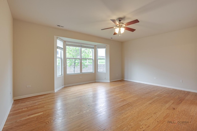3629 Canton Cir, Mundelein, IL 60060 - unfurnished room featuring a ceiling fan, light wood-style flooring, and baseboards