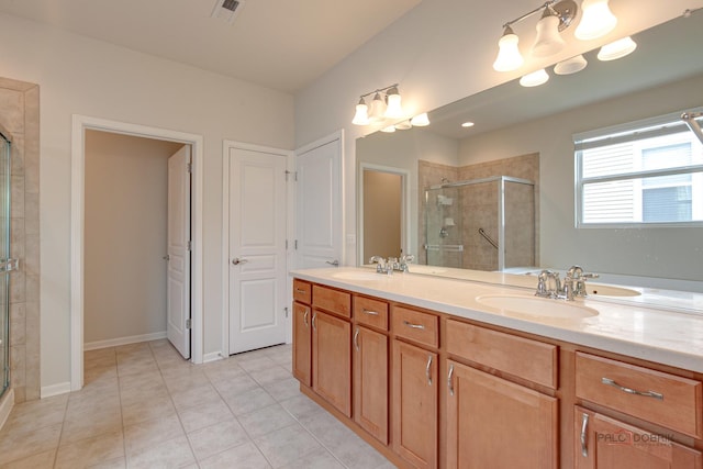 3629 Canton Cir, Mundelein, IL 60060 - bathroom featuring a stall shower, tile patterned flooring, and double vanity