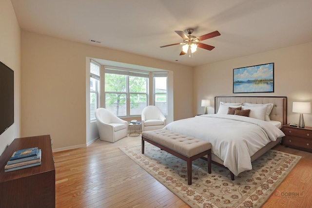 3629 Canton Cir, Mundelein, IL 60060 - bedroom featuring light wood finished floors, a ceiling fan, and baseboards