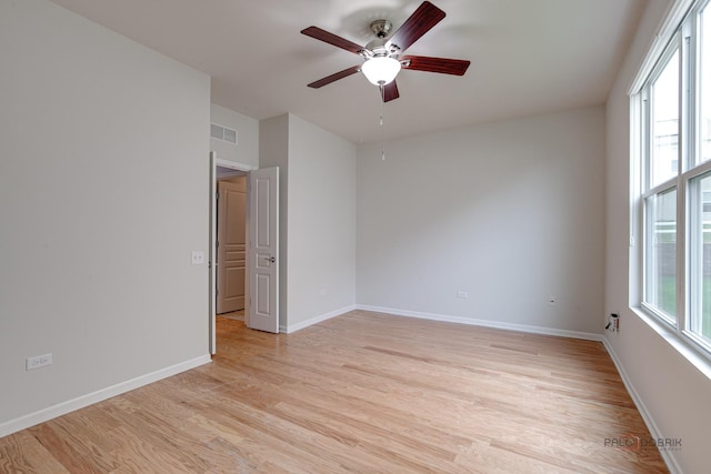 3629 Canton Cir, Mundelein, IL 60060 - spare room featuring ceiling fan, light wood-style flooring, and baseboards