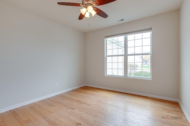 3629 Canton Cir, Mundelein, IL 60060 - spare room featuring light wood-style flooring, ceiling fan, and baseboards