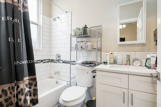 9841 S Ewing Ave, Chicago, IL 60617 - full bath featuring shower / tub combo with curtain, toilet, vanity, and tile walls