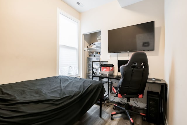 9841 S Ewing Ave, Chicago, IL 60617 - bedroom with wood finished floors and a desk