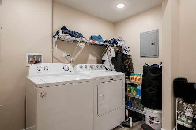 9841 S Ewing Ave, Chicago, IL 60617 - clothes washing area with electric panel, separate washer and dryer, and wood finished floors