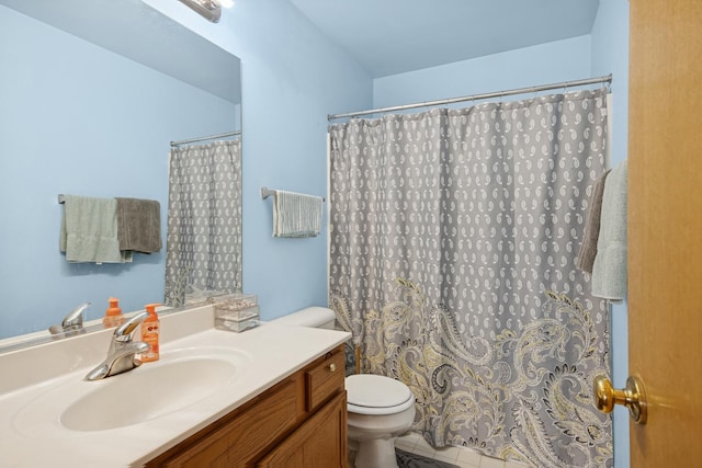 4 W Tall Oak Dr, Hainesville, IL 60073 - bathroom featuring toilet, vanity, tile patterned flooring, and a shower with curtain
