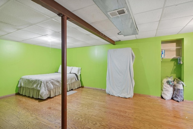 4 W Tall Oak Dr, Hainesville, IL 60073 - bedroom with wood finished floors, a drop ceiling, and baseboards