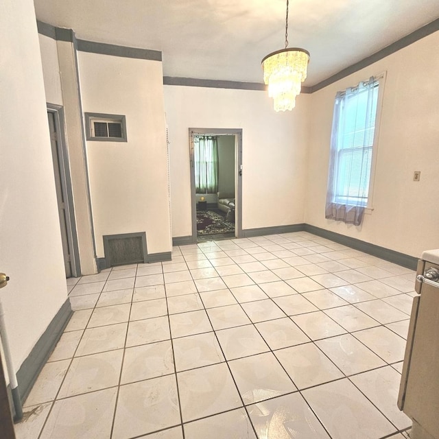 4850 S Honore St, Chicago, IL 60609 - unfurnished dining area with plenty of natural light, a chandelier, light tile patterned floors, and baseboards