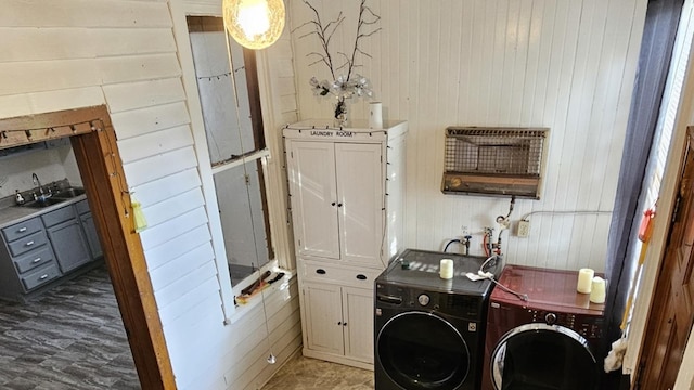 4850 S Honore St, Chicago, IL 60609 - washroom featuring independent washer and dryer, a sink, and wooden walls
