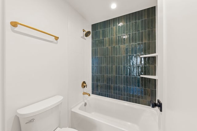 full bathroom featuring tub / shower combination and toilet